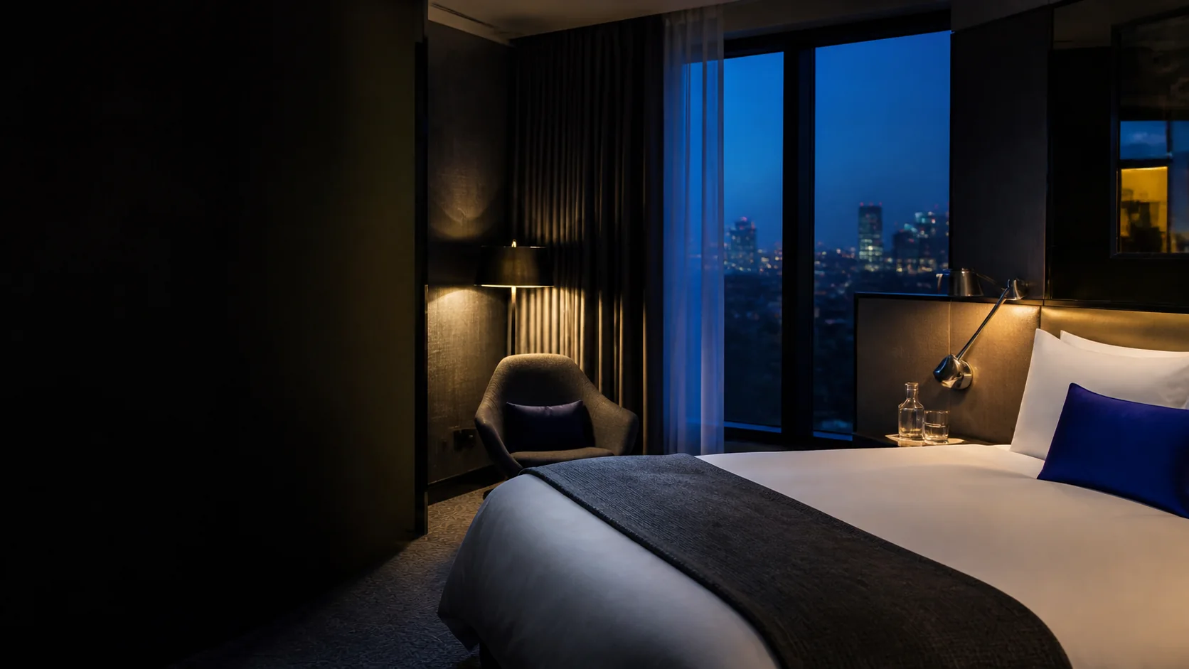 An empty hotel room at night